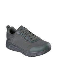 Sneaker impermeabile grigio con tomaia in tessuto a rete, colletto imbottito e suola testurizzata flessibile. Presenta chiusura con lacci e punta rinforzata.