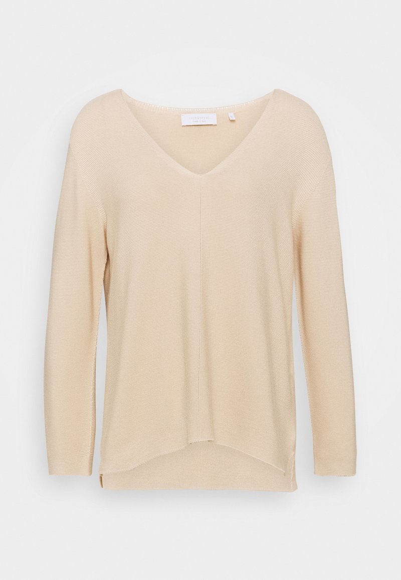 Hellbeige gestrickter Pullover mit V-Ausschnitt, langen Ärmeln, geripptem Struktur, seitlichen Schlitzungen und lockerer Passform.