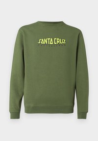 Φούτερ παρωπίδας σε ελιά απόχρωση με μακριά μανίκια, με κεντρικό κίτρινο και μαύρο λογότυπο "Santa Cruz Skateboards" στο στήθος.