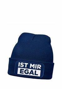 Navy beanie hat with ribbed texture, featuring a white rectangular patch labeled "IST MIR EGAL" in bold lettering at the front.