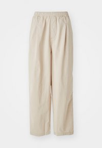 Beige, højtaljede bukser med en tekstureret overflade, der har en elastisk talje og sidelommer, designet til en løs pasform.