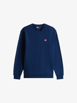 Tumši zils džemperis, izgatavots no kokvilnas, ar apaļu kakla izgriezumu, garām piedurknēm un mazu logotipa uzšūtu izgriezumu kreisajā krūtī. Gluda tekstūra.