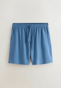 Blå shorts med elastisk talje, snøre foran og sidelommer, vist fladt på en lys baggrund.