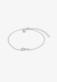 Pulsera de cadena de plata con un pequeño símbolo de infinito en el centro adornado con diminutos cristales y un cierre ajustable.