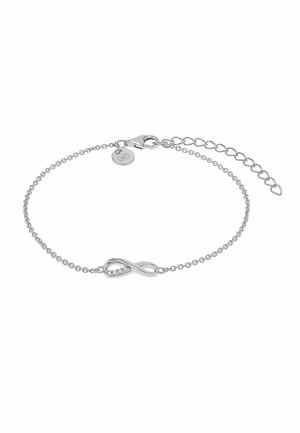 Pulsera de cadena de plata con un pequeño símbolo de infinito en el centro adornado con diminutos cristales y un cierre ajustable.