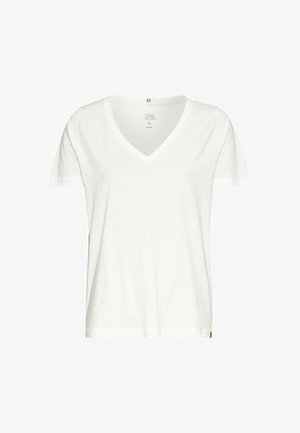 Hvid økologisk bomulds t-shirt med v-hals, korte ærmer og let afrundet kant. Har et lille logomærke på undersiden.