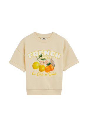 Beige Sweatshirt mit kurzen Ärmeln, auf der Vorderseite mit dem Text "FRENCH RIVIERA", Illustrationen von Zitrusfrüchten und Blumen sowie der Schriftzug "Le Club de Soleil".
