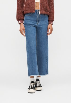 - Jeansy Relaxed Fit