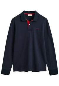 Tengerészeti hosszú ujjú polo póló pamutból, piros gallér részletekkel. Két gombos nyakmegoldása és kis logója van a mellkasán. Puha tapintású.