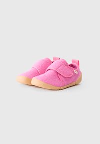 Pink felt shoes with a soft texture, featuring a wide Velcro strap and a tan rubber sole. Designed for comfort and ease of wear.