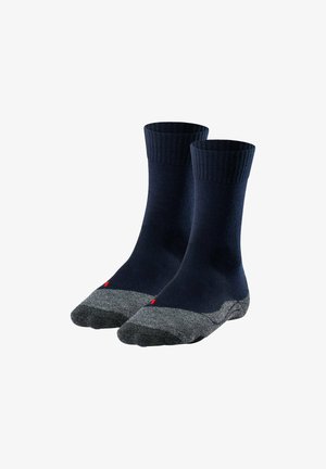 Marineblaue Socken mit geripptem Bündchen, kontrastierender grauer Zehen- und Fersenpartie und rotem Akzent am Knöchel. Hergestellt aus einem glatten, strapazierfähigen Material.