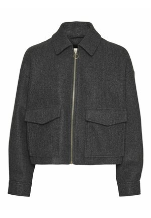 Hallide hallide villasegu jakk kraega, ees lukk ja kaks suurt klapptaskut. Omab lühendatud disaini ja tekstuurset kangast.