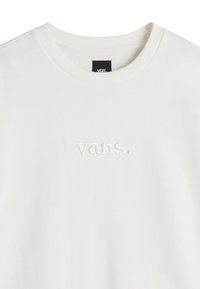 T-shirt blanc à col rond avec un logo "vans." blanc brodé de manière subtile, centré sur la poitrine sous l'encolure.