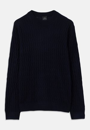 Suéter de manga larga azul marino con un patrón de punto texturizado en ondas y cuello redondo acanalado, puños y dobladillo de Armani Exchange.