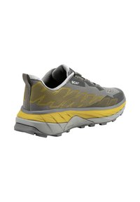 Trailrunning-Schuh in Grau und Gelb mit einem Obermaterial aus Mesh, BOA®-Schnürsystem, strukturierten Seiten und einer multidirektionalen Gummisohle.