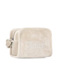Borsa in velluto beige con forma rettangolare, dotata di chiusura con zip e decorata con il testo "Juicy" in strass sulla parte anteriore.