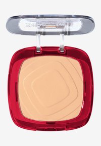 Poudre compacte avec une surface lisse et beige dans un étui transparent avec bord rouge. La poudre présente un motif géométrique.
