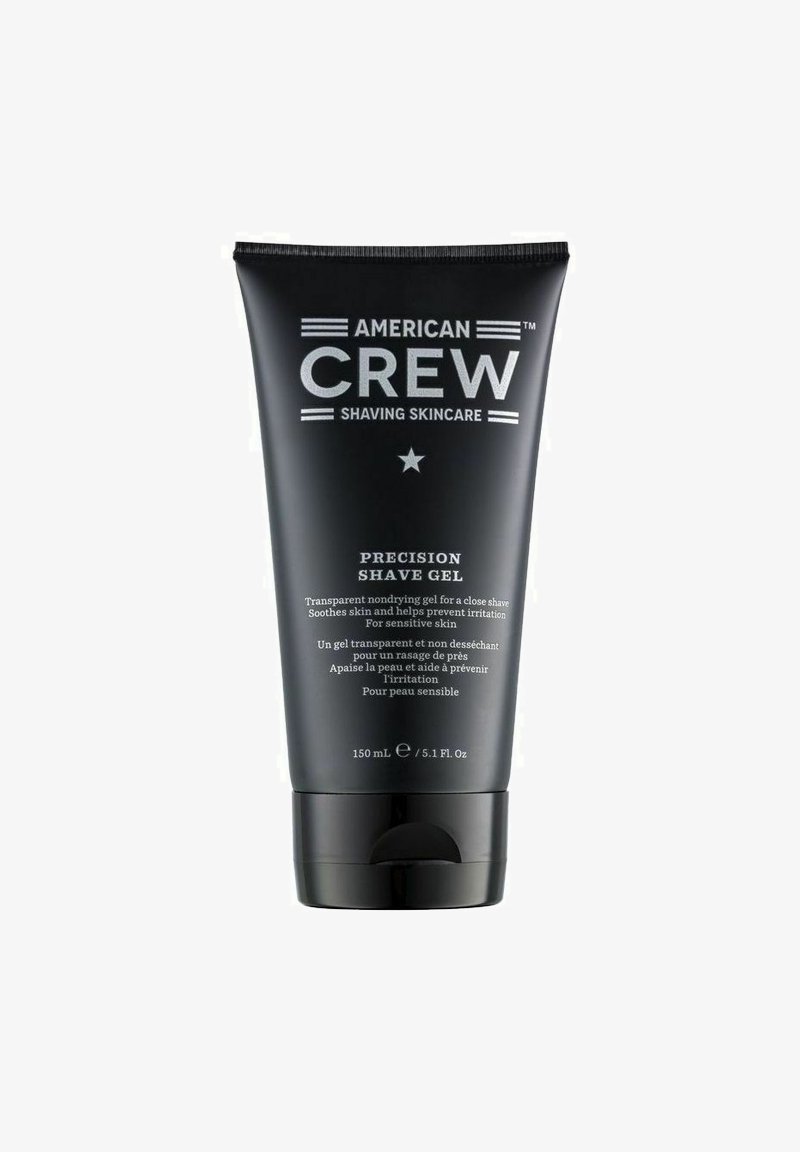 Sort tube med en mat finish, sølvtekst og en stjernegrafik. Indeholder 150 mL af gennemsigtig barbergel til sensitiv hud.