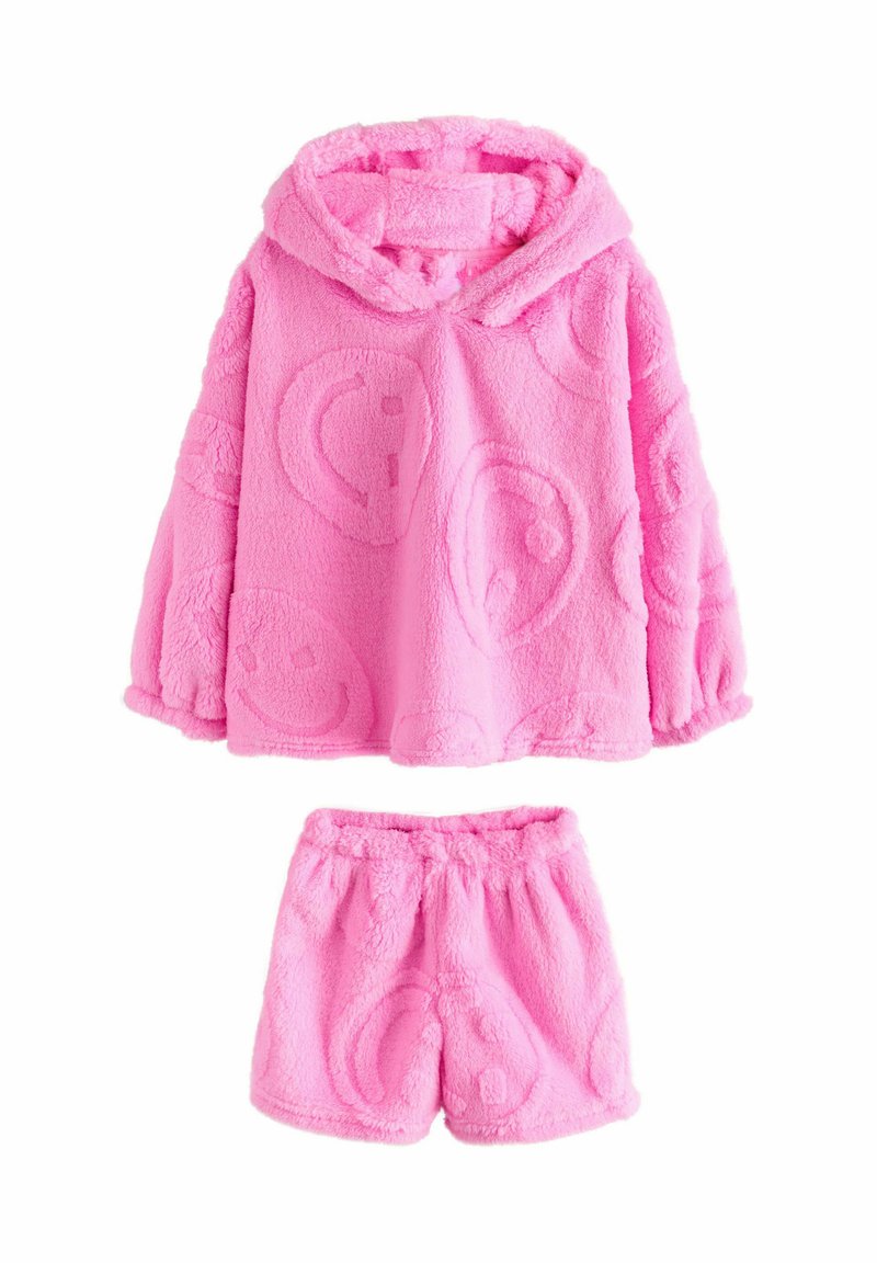 Lyserødt, blødt to-delt afslapningstøjssæt med en hættetrøje med smiley-mønstre og matchende shorts. Blød tekstur og løs pasform.