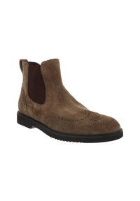 Bottines Chelsea en daim marron avec perforations brogue, panneaux latéraux élastiques, tirant et semelle en caoutchouc noir.