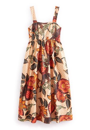 Robe sans manches avec larges bretelles, présentant de grands motifs floraux et feuillus en orange, rouge, noir et vert sur un fond beige.