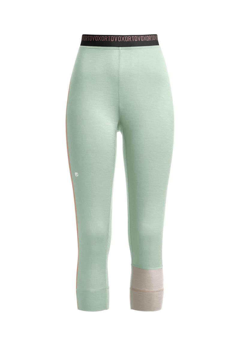 Light green athletic leggings with a black waistband, featuring contrasting beige accents at the lower legs and a smooth, stretchy texture.