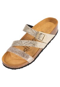 Platt slide sandal med två diagonala remmar i metalliskt guld och silverglitter, fotbädd som liknar kork och texturerad svart gummisula.