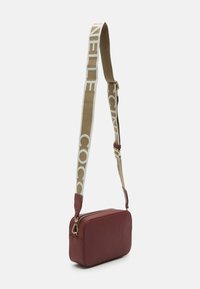 Coccinelle TEBE - Cross body bag - bordeaux