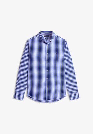 Blå og hvit rutete skjorte med lange ermer, krage og logo på venstre bryst, vist på hvit bakgrunn.