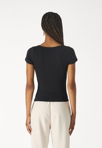 Hollister Co. ICON HENLEY  - T-shirt basic - casual black