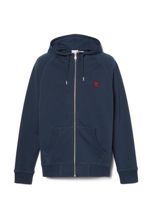 Felpa con zip di colore blu navy, dotata di tasche frontali, cappuccio con cordino e piccolo logo rosso a forma di albero sul lato sinistro del petto.