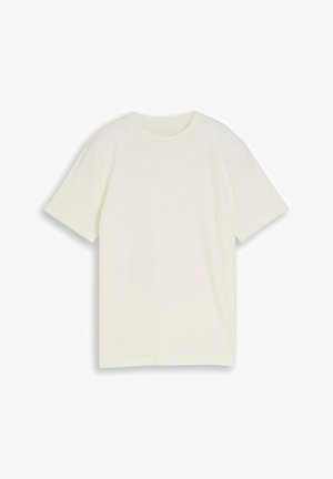Camiseta blanca lisa de manga corta y cuello redondo, colocada plana sobre un fondo blanco.