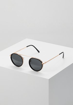 Sunheroes Lunettes de soleil - pale gold-coloured black/smoke