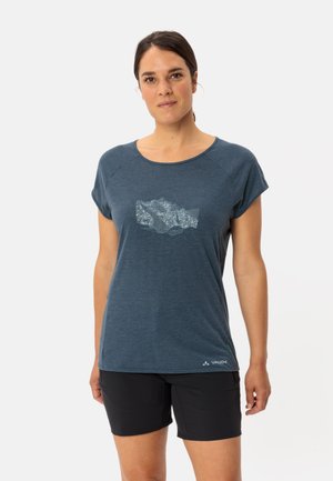 Blue, short-sleeve shirt with a round neckline and a graphic design on the front. Made from a lightweight fabric, paired with black shorts.