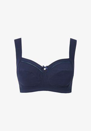 Marineblå bh med brede stropper, underwire støtte, en glat stofstruktur og en dekorativ sløjfe i midten med subtile stikninger.