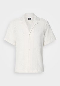 Witte korte mouw shirt met een subtiel golfpatroon en een knoopsluiting aan de voorkant. Gemaakt van een geweven stof met een kraag en een ontspannen pasvorm.