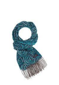 Sciarpa turchese con un motivo vorticoso in azzurro chiaro e bianco, con frange alle estremità. Il tessuto appare morbido e texturizzato.