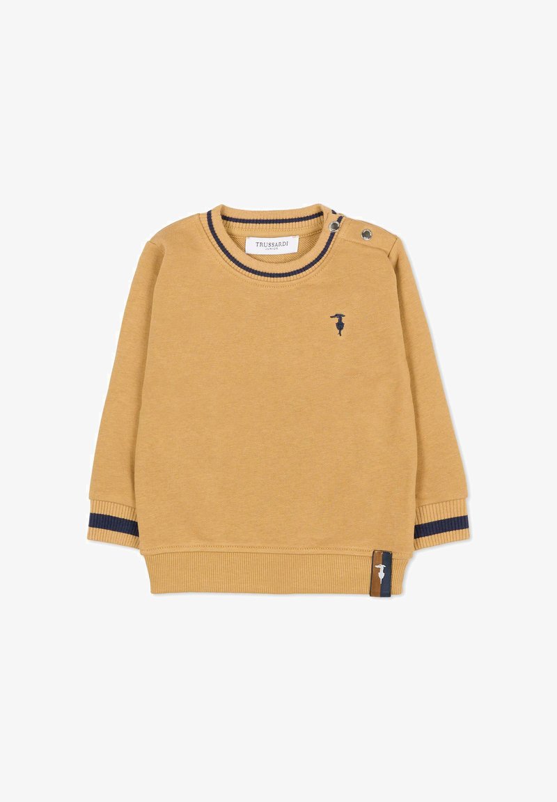 Mosterdgele sweatshirt met een geribbelde ronde hals, marineblauwe strepen op de manchetten en een klein logo-detail. Voorzien van drukknoopjes op de schouder.