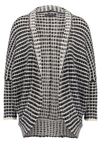 Grosse cardigan noir et blanc, fabriqué dans un matériau duveteux avec un motif rayé. Il présente une coupe ouverte et ample à l'avant et des manches longues.