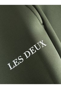 Les Deux BALLIER TRACK PANTS - Tepláky - olive night