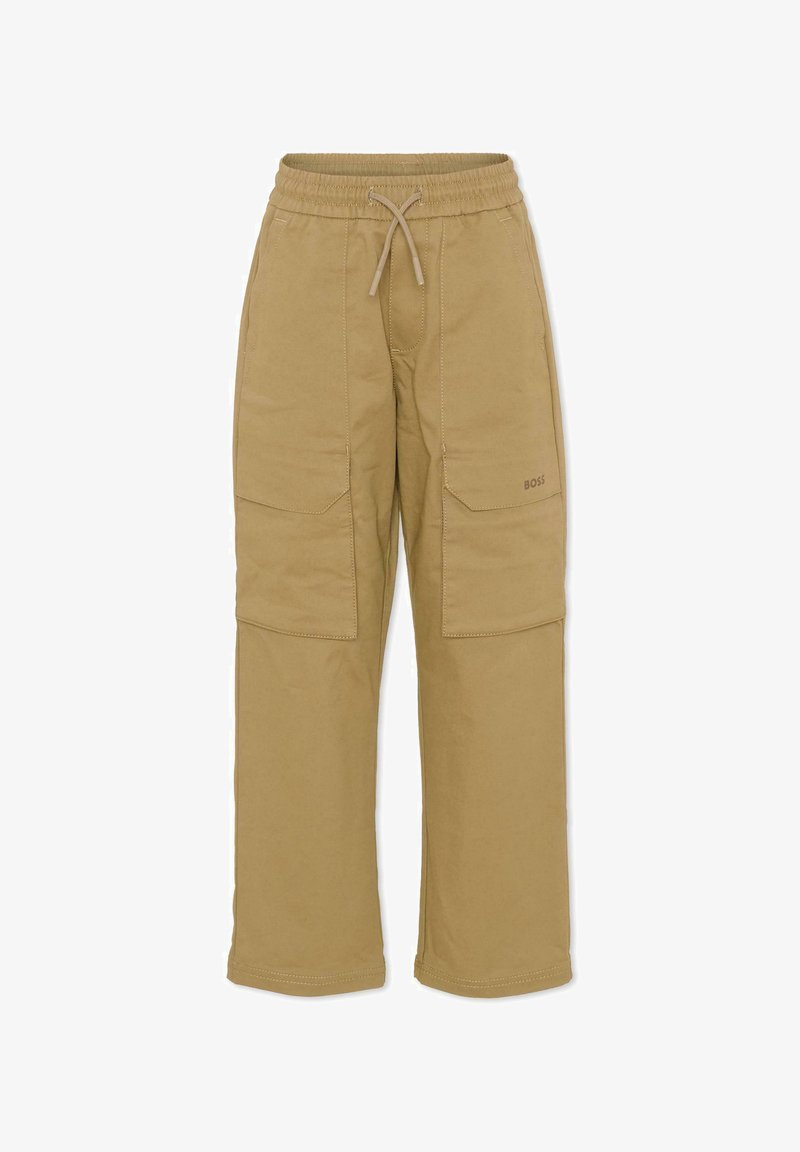 Pantalon cargo beige avec une taille élastique, un cordon de serrage et deux grandes poches latérales. Fabriqué en tissu robuste, avec un détail de logo discret.