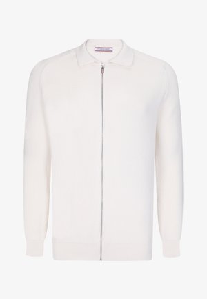 Cardigan bianco con zip e colletto, caratterizzato da una texture a coste, maniche lunghe e una zip argentata. Progettato con una silhouette aderente.