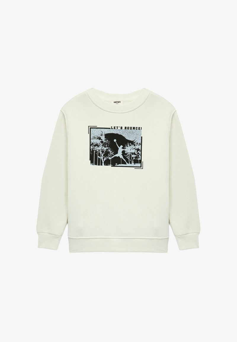 Sudadera de un beige claro con un diseño gráfico que incluye el texto "¡VAMOS A REBOTAR!" y una silueta en negro, cuello redondo y puños de canalé.