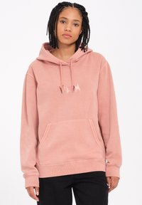 Pink hoodie with a front pocket, drawstring hood, and embroidered logo. Soft fabric with a relaxed fit and ribbed cuffs and hem.