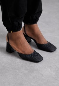 Tacones - nero