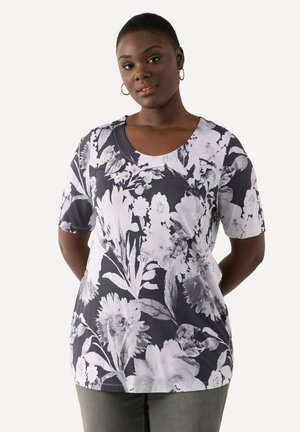 Schwarzes und weißes T-Shirt mit Blumenmuster, kurzen Ärmeln, Rundhalsausschnitt, aus glattem Stoff gefertigt und mit lockerer Passform.