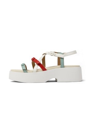Platform sandals with white faux leather upper, red and mint accents, adjustable ankle strap, and a textured white sole.
