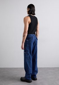 GmbH WORKWEAR TROUSERS - Relaxed fit jeans - indigo