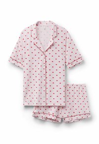 Hellrosa kurzärmliges Pyjama-Oberteil mit Knopfleiste und elastischen Bundshorts mit kleinem roten Herzmuster und roter Paspelierung.