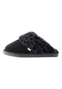 Chausson noir avec une bande en fausse fourrure moelleuse, corps en suède, semelle plate et surpiqûres contrastées. Comprend une petite étiquette de marque sur le côté.